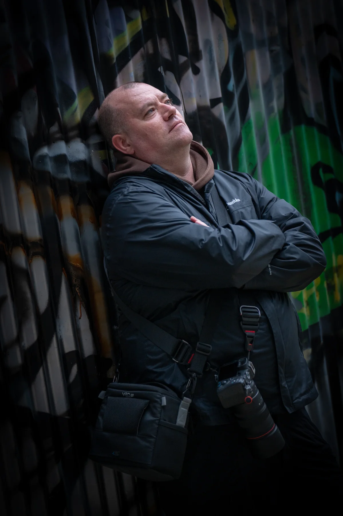 Adam Dunstan with his camera in a Melbourne laneway